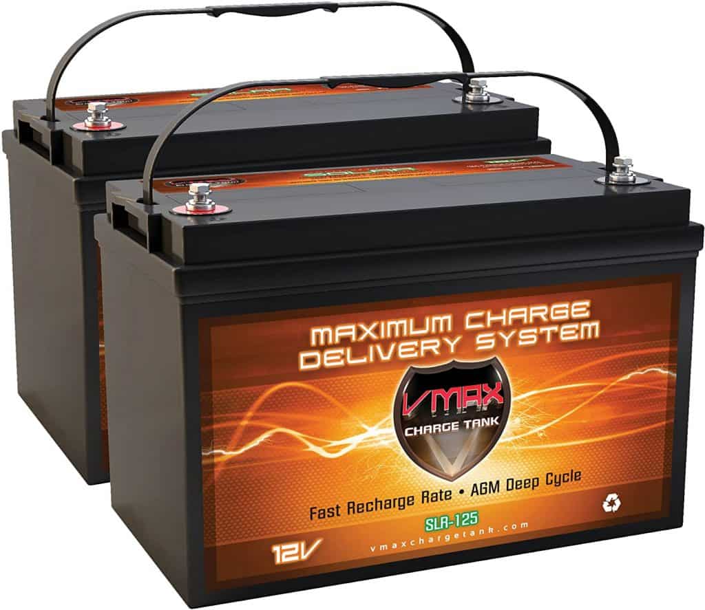 This image depicts two VMAX solar batteries, essential components for powering a camper conversion van, providing reliable and efficient energy storage.