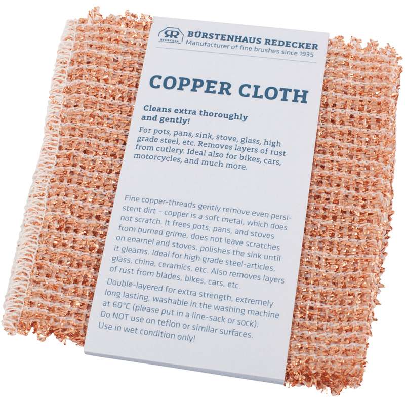 A copper cloth still in its packaging, designed for thorough and gentle cleaning of pots, pans, sinks, glass, and more, ideal for a camper conversion van where space and efficiency are key.