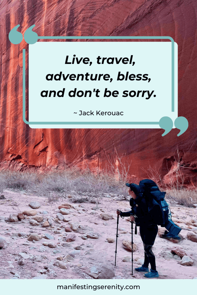 You see me hiking with a large backpack and trekking poles in a rugged, rocky area with striking red canyon walls. The quote by Jack Kerouac above me reads, "Live, travel, adventure, bless, and don't be sorry," perfectly fitting the theme of inspirational adventure quotes.