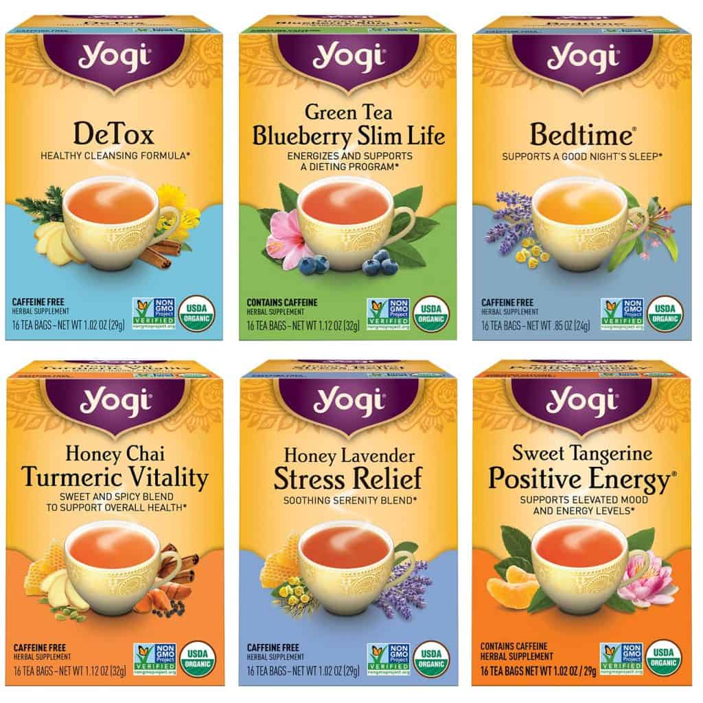 A variety of Yogi teas in colorful boxes, featuring flavors like Detox, Bedtime, and Honey Lavender Stress Relief, which are easy and comforting snacks you can bring on an airplane to enjoy a warm, soothing drink during your flight.