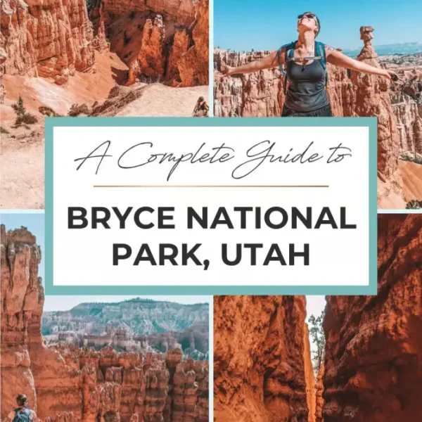 A breathtaking view of Bryce National Park, with its unique orange rock formations and spires rising against a clear blue sky. The landscape is both dramatic and beautiful, highlighting the park’s distinct, otherworldly scenery.