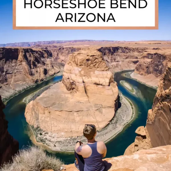 The iconic Horseshoe Bend in Arizona, where the Colorado River curves around a striking red rock formation. The dramatic shape of the river and the surrounding cliffs create a stunning, almost surreal landscape.