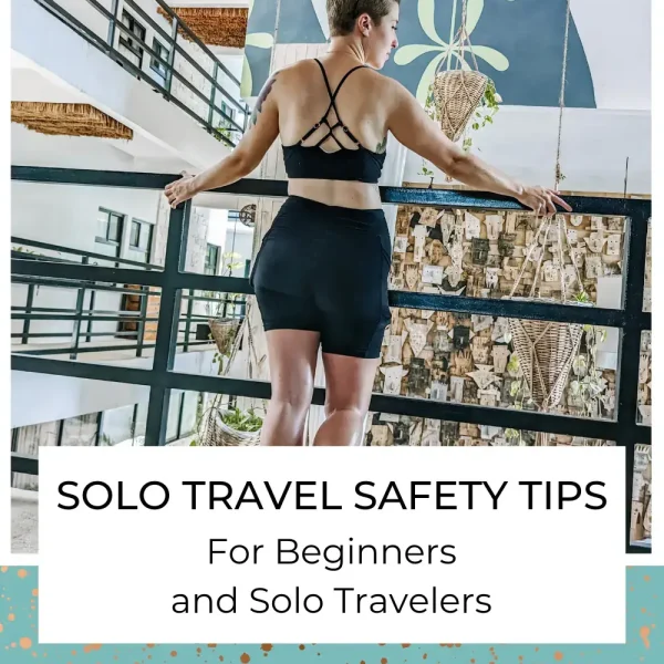 I'm wearing a black sports bra and cycling short while looking into the crafted walls with hanging plants, preparing for a solo and safety travel safety.