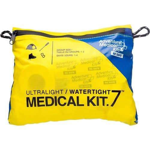 A yellow and blue ultralight watertight medical kit, essential for handling emergencies and first aid needs on the ultimate backpacking packing list.