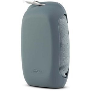 A gray foam seat cushion designed for added comfort during extended meditation sessions, perfect for use at a Vipassana Meditation Retreat.